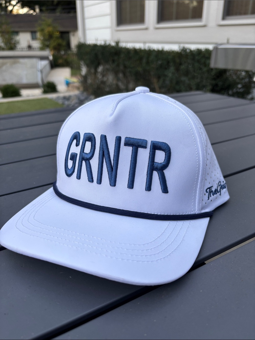 White & Navy Embroidered Trucker Hat